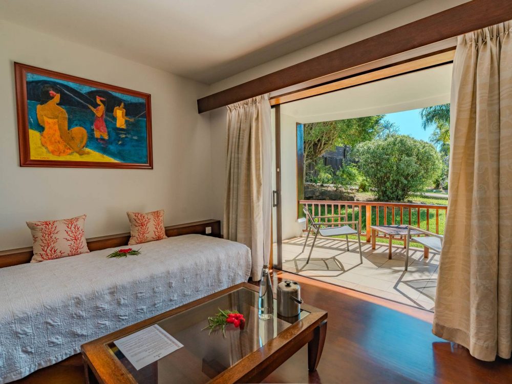 Spacious layout in the Garden Room featuring an extra bed for a third guest at Manava Beach Resort and Spa Moorea